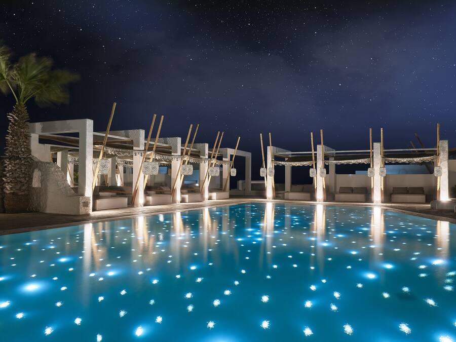 Indoor pool, outdoor pool, pool umbrellas, sun loungers