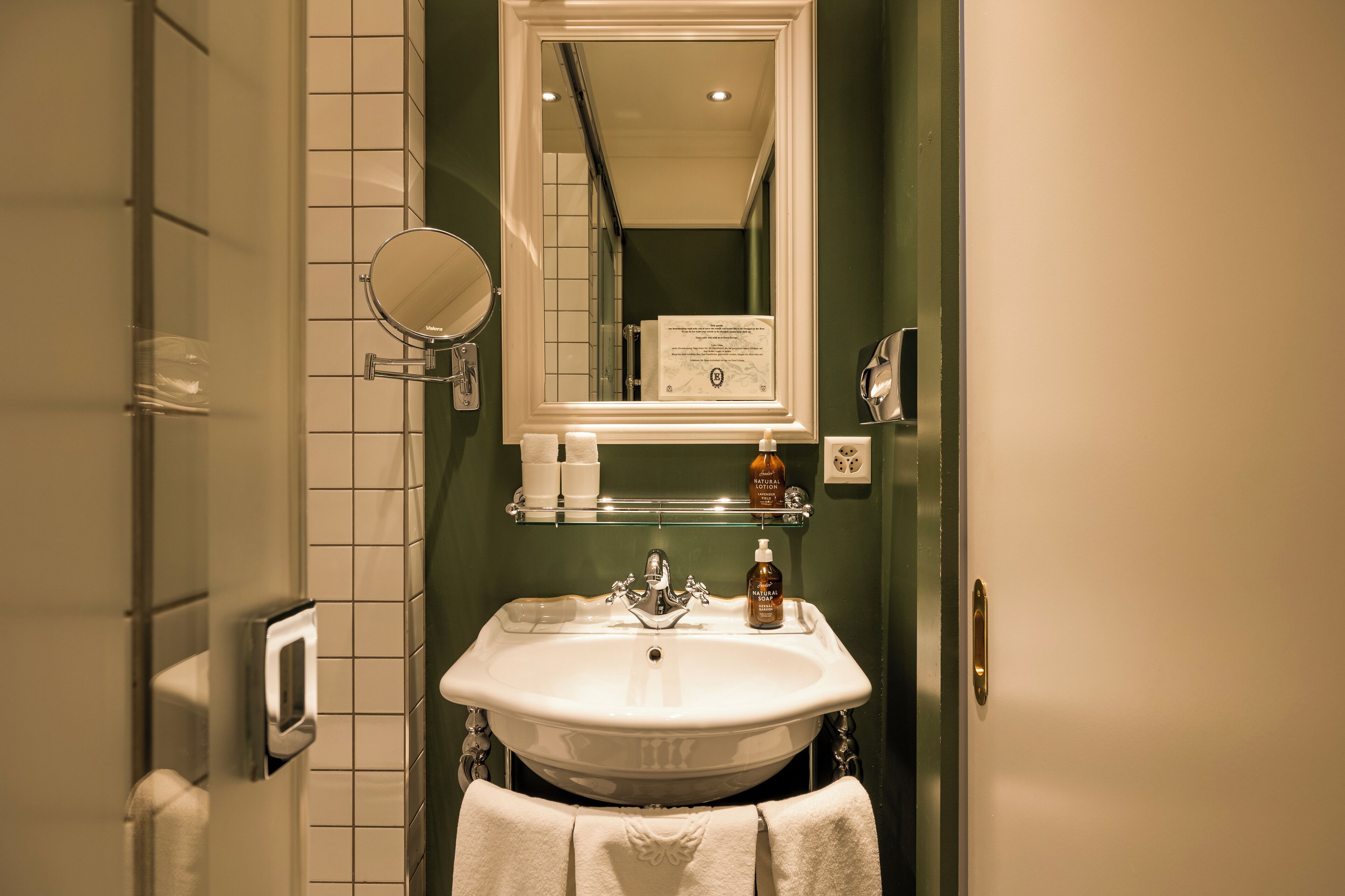 superior double room | bathroom | designer toiletries, hair dryer, towels