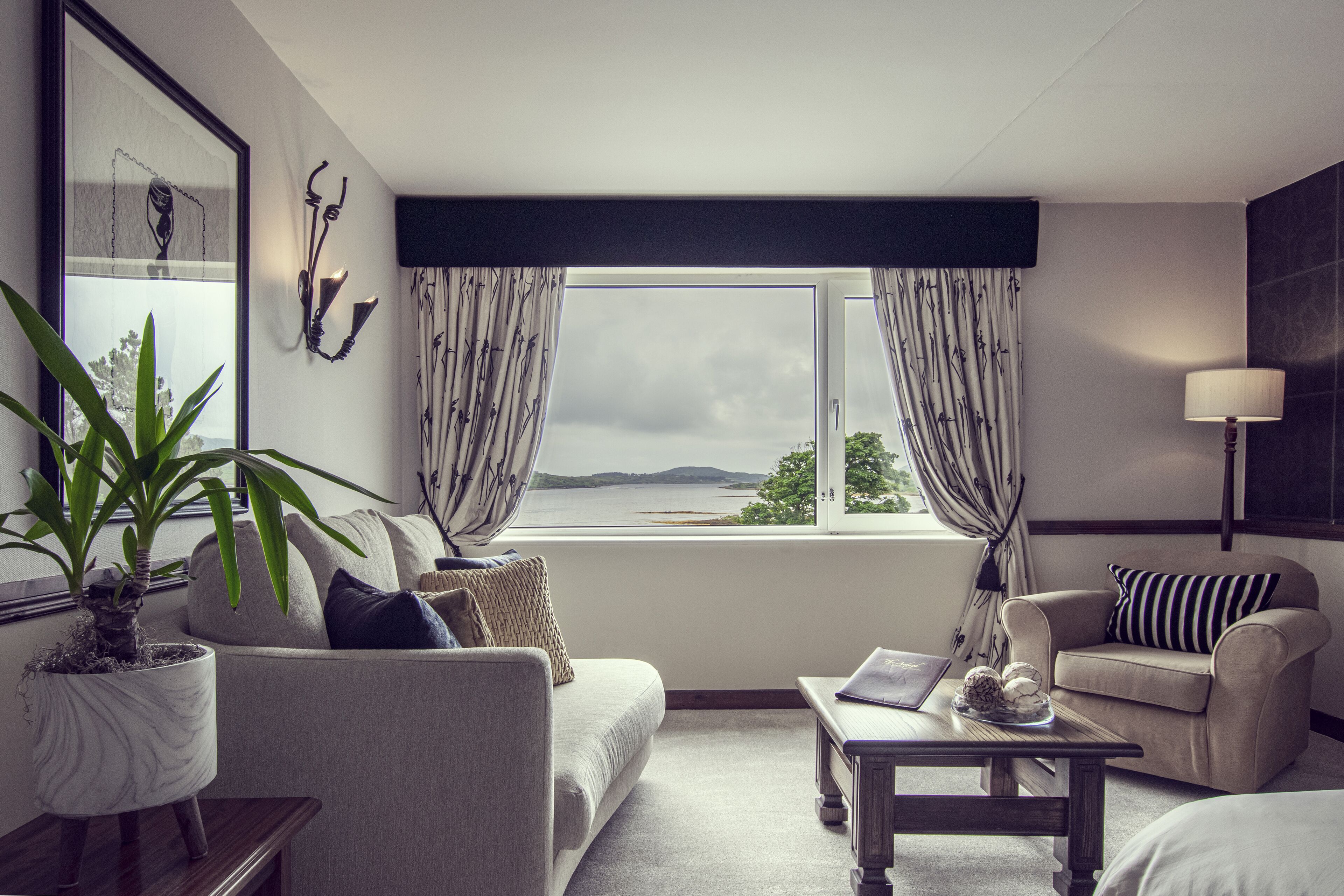 luxury studio suite, multiple beds, sea view, sea facing | living area | lcd tv