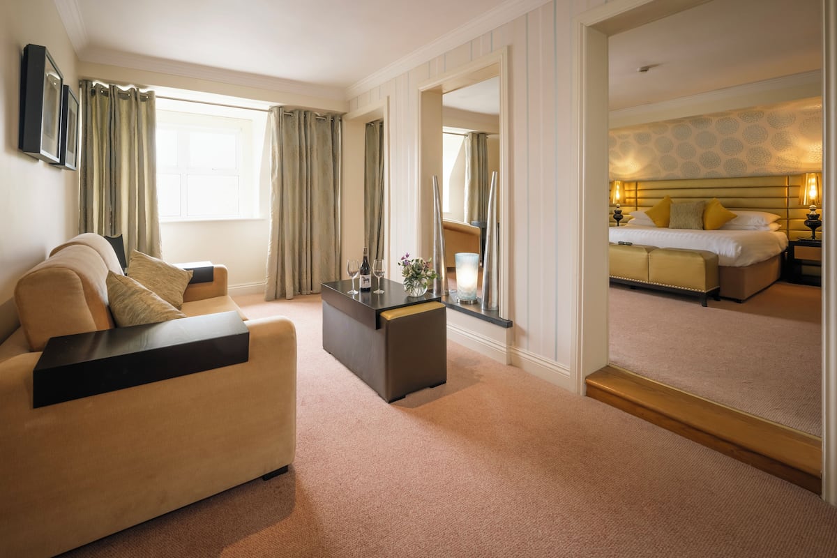 in-room safe, desk, blackout curtains, iron/ironing board