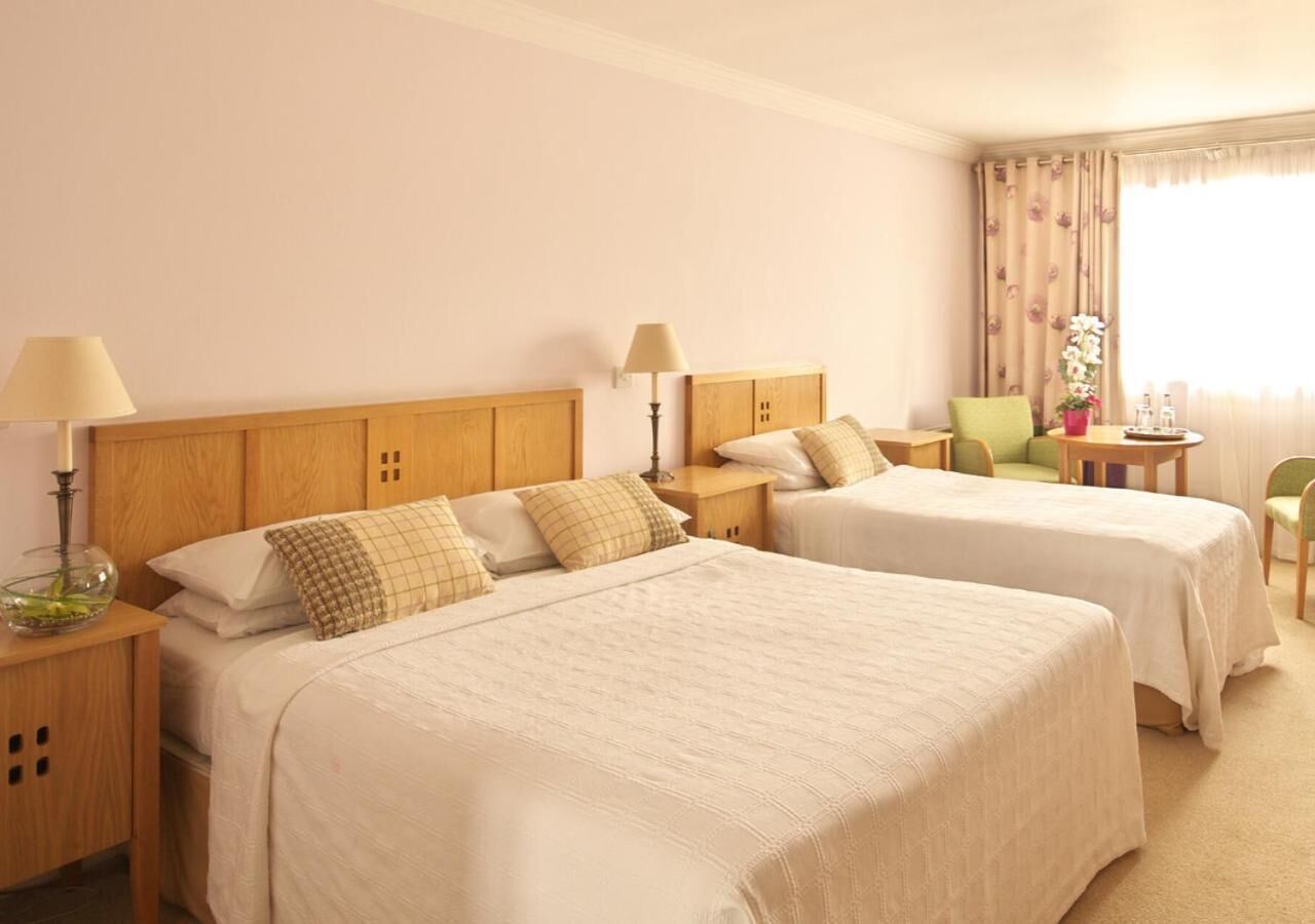 in-room safe, desk, blackout curtains, iron/ironing board