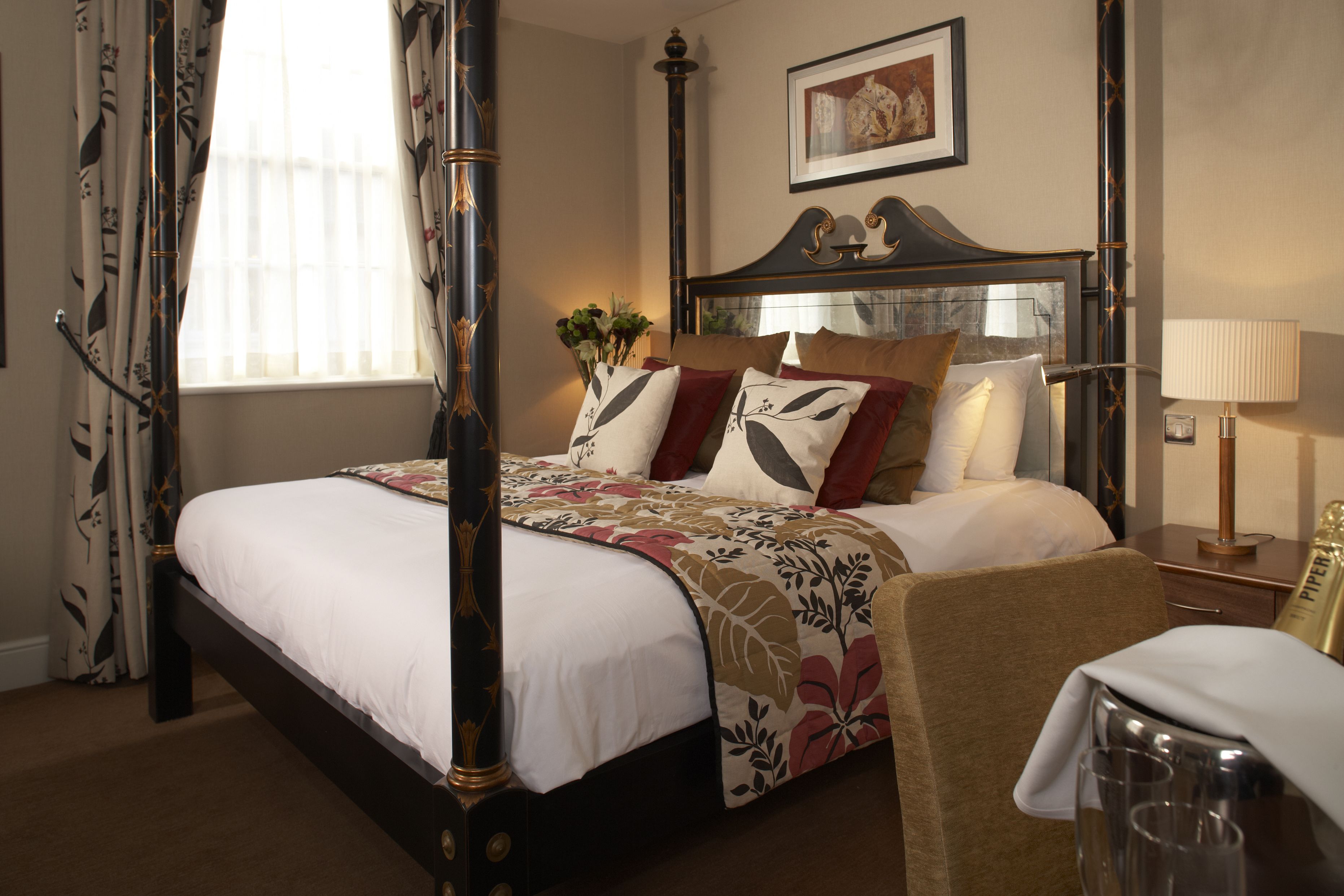 suite, 1 king bed, non smoking (four poster bed) | premium bedding, select comfort beds, in-room safe, desk