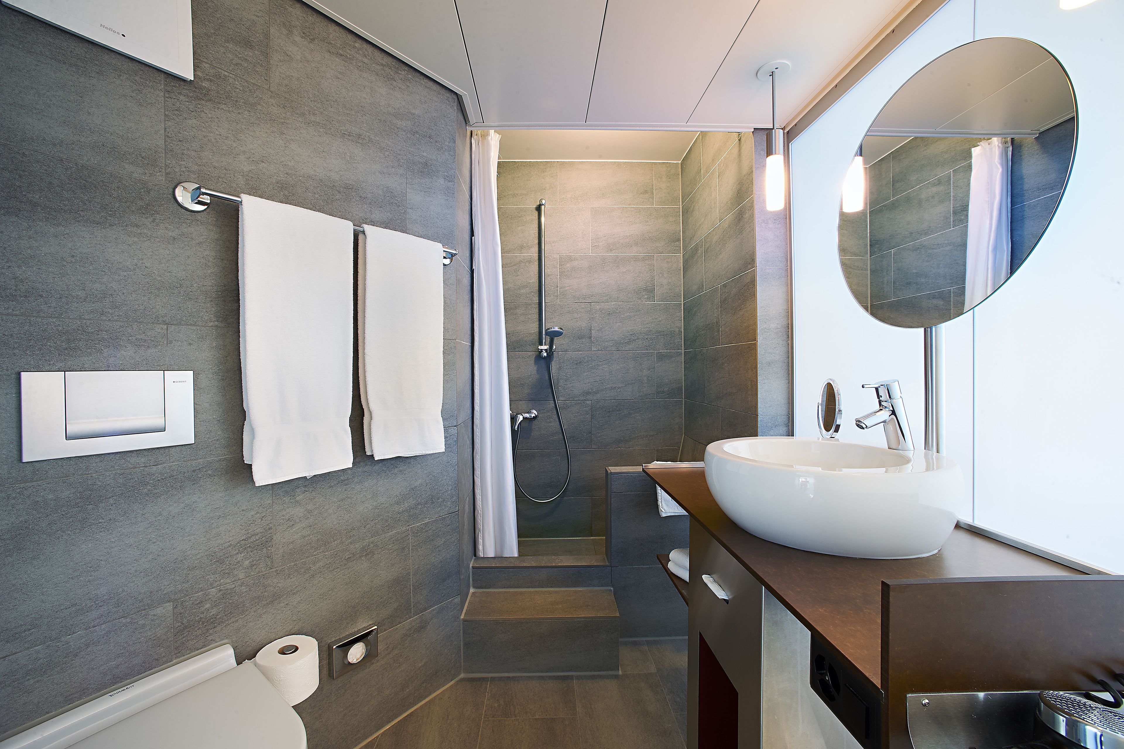 comfort room | bathroom | free toiletries, hair dryer, bathrobes, slippers