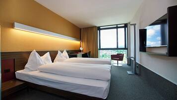 Quadruple Room | Hypo-allergenic bedding available, minibar, in-room safe, desk