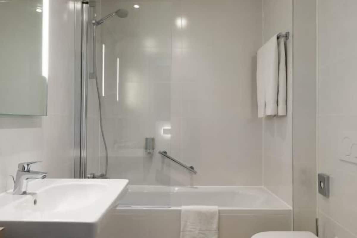 Bathroom | Eco-friendly toiletries, hair dryer, towels, soap