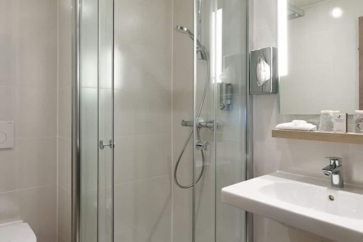 Bathroom | Eco-friendly toiletries, hair dryer, towels, soap