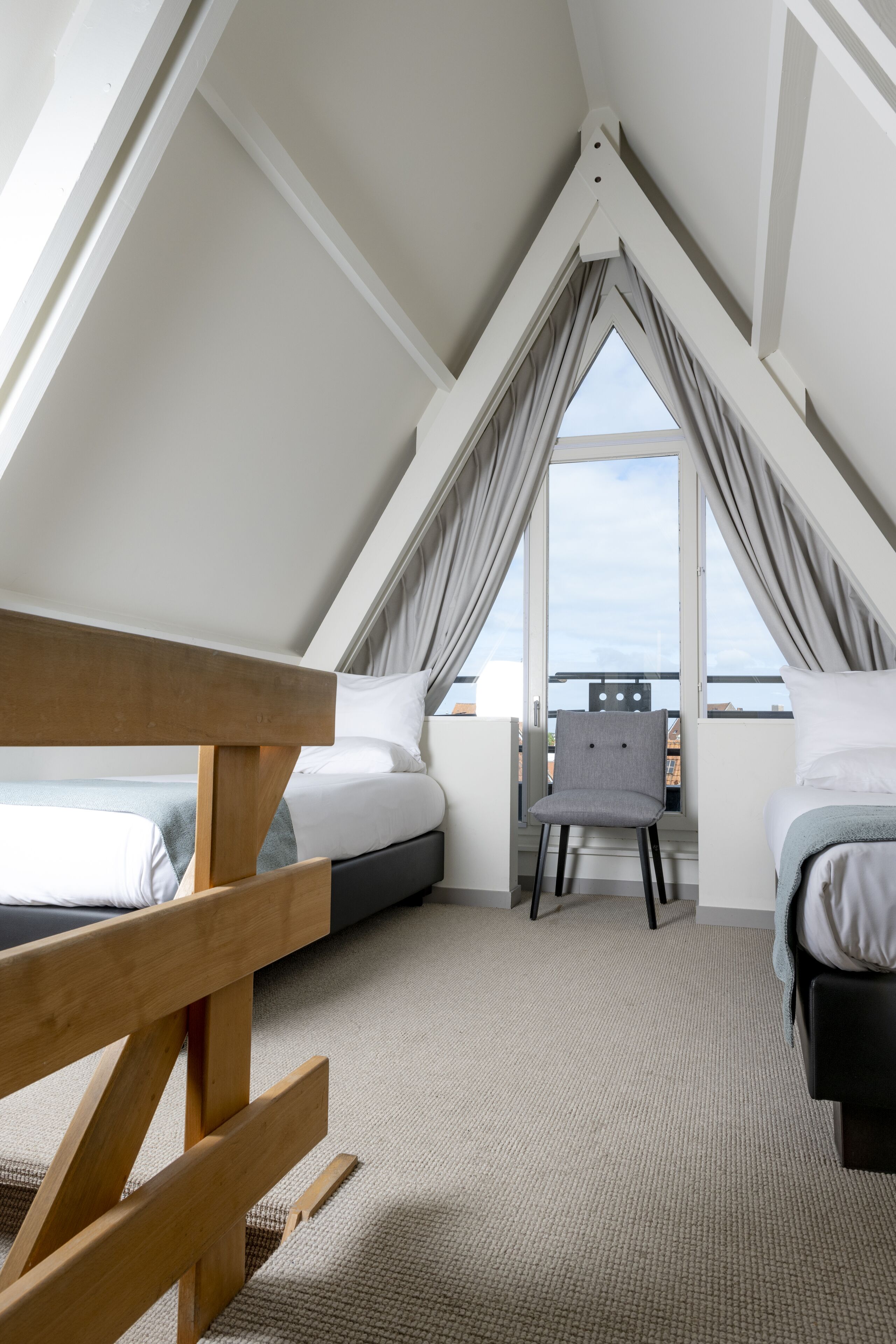 comfort twin room with bath (only accessible by stairs) | in-room safe, desk, iron/ironing board, free wifi