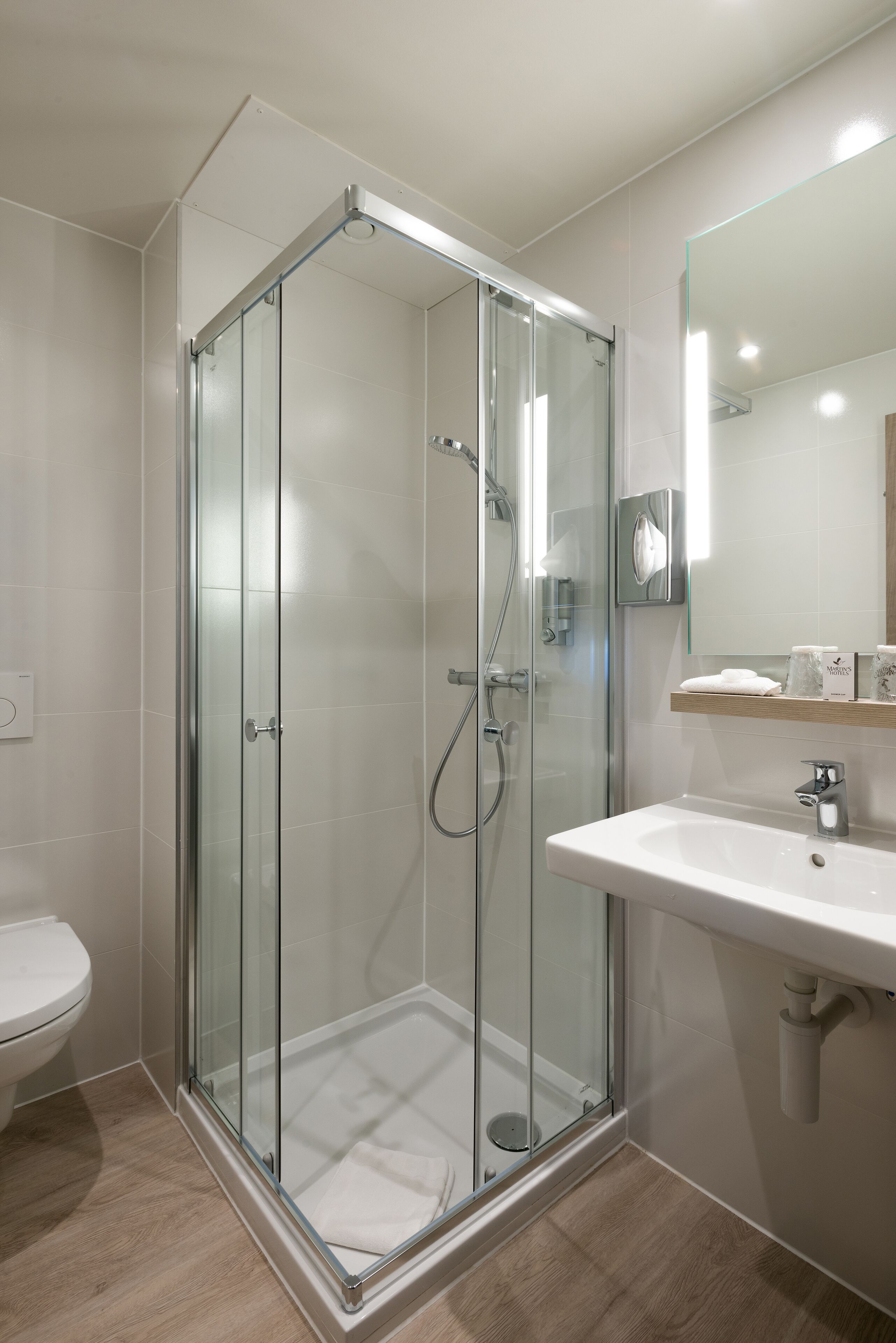 eco-friendly toiletries, hair dryer, towels, soap