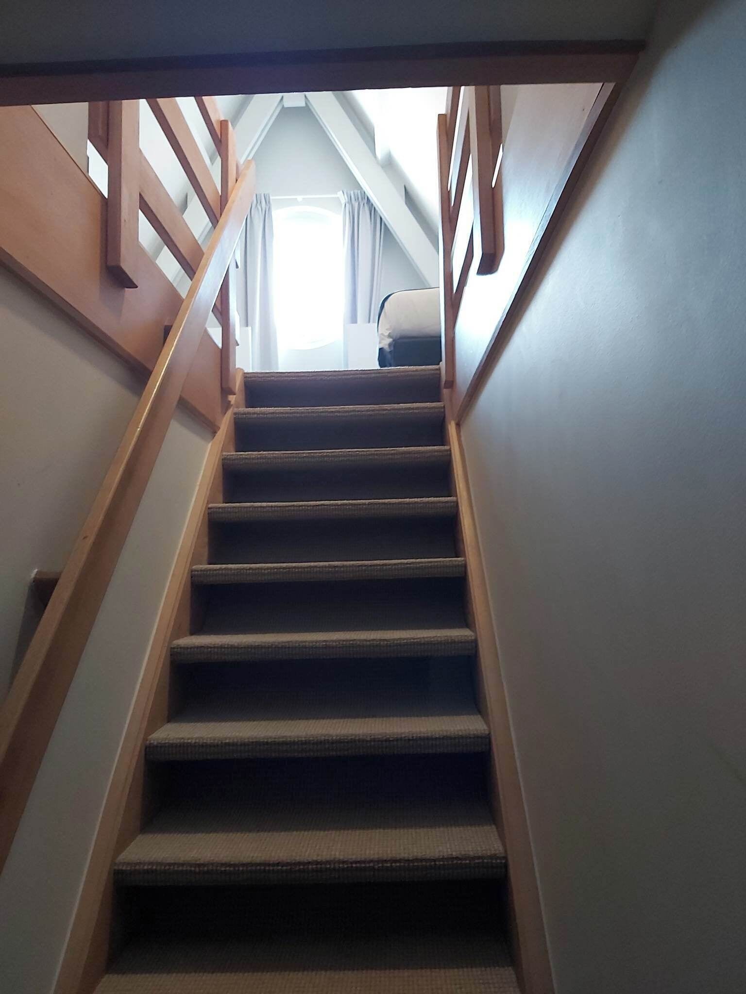 comfort twin room with bath (only accessible by stairs) | in-room safe, desk, iron/ironing board, free wifi