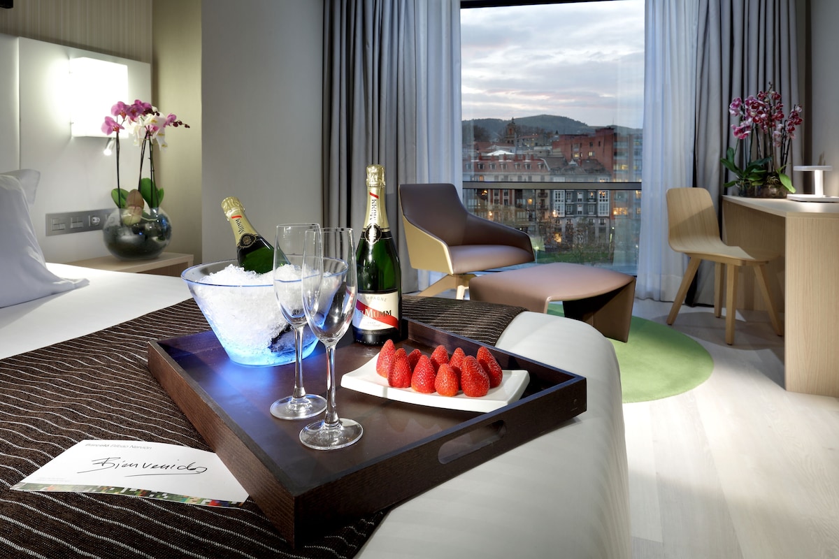 Premium bedding, down comforters, minibar, in-room safe