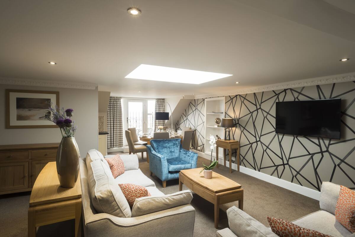 Penthouse, 2 Bedrooms | Living area | 32-inch flat-screen TV with digital channels, TV