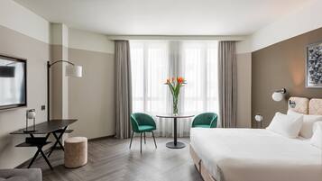 Premium bedding, down comforters, minibar, in-room safe