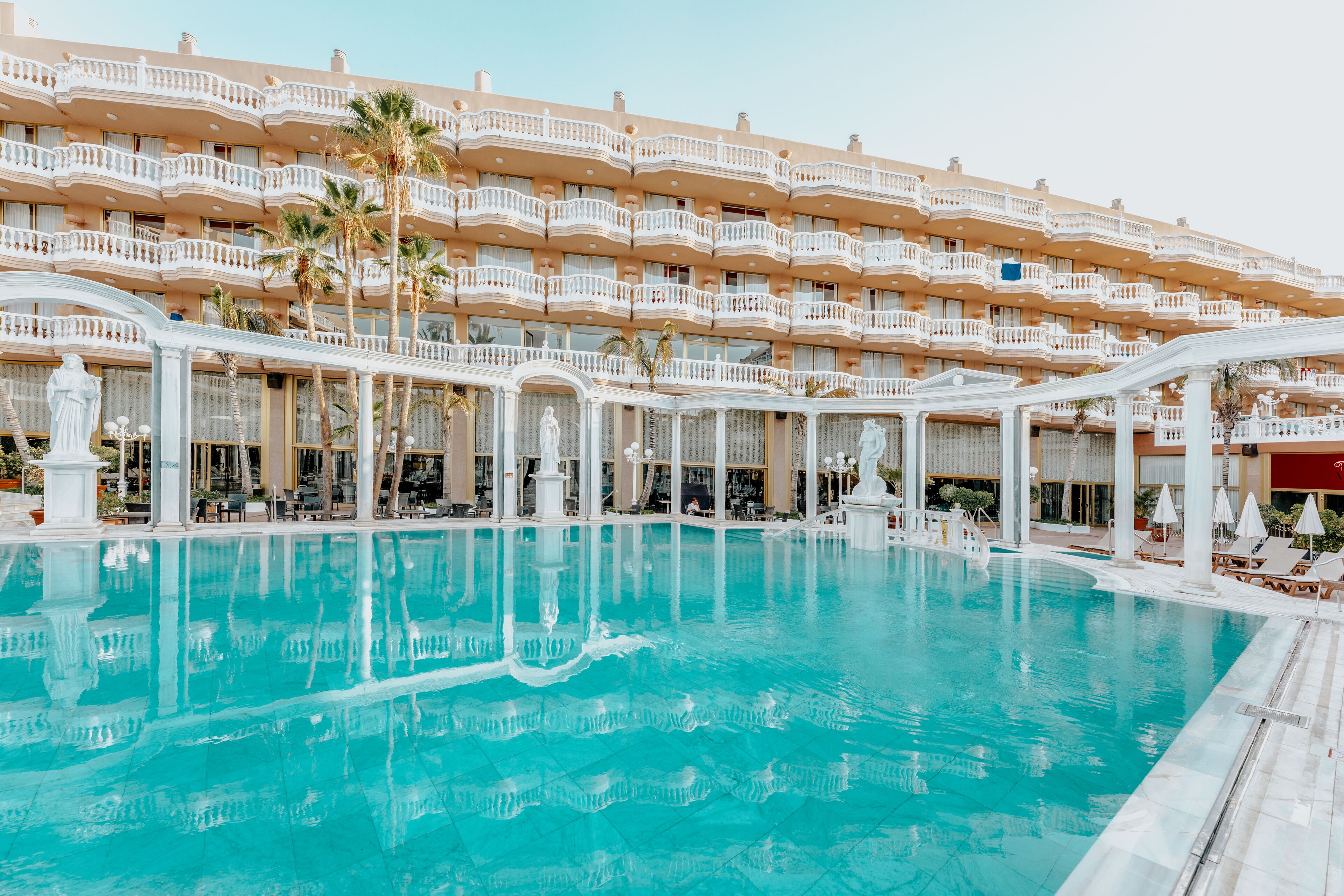 outdoor pool, pool umbrellas, pool loungers