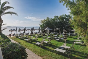 Beach nearby, sun-loungers, beach umbrellas, beach towels
