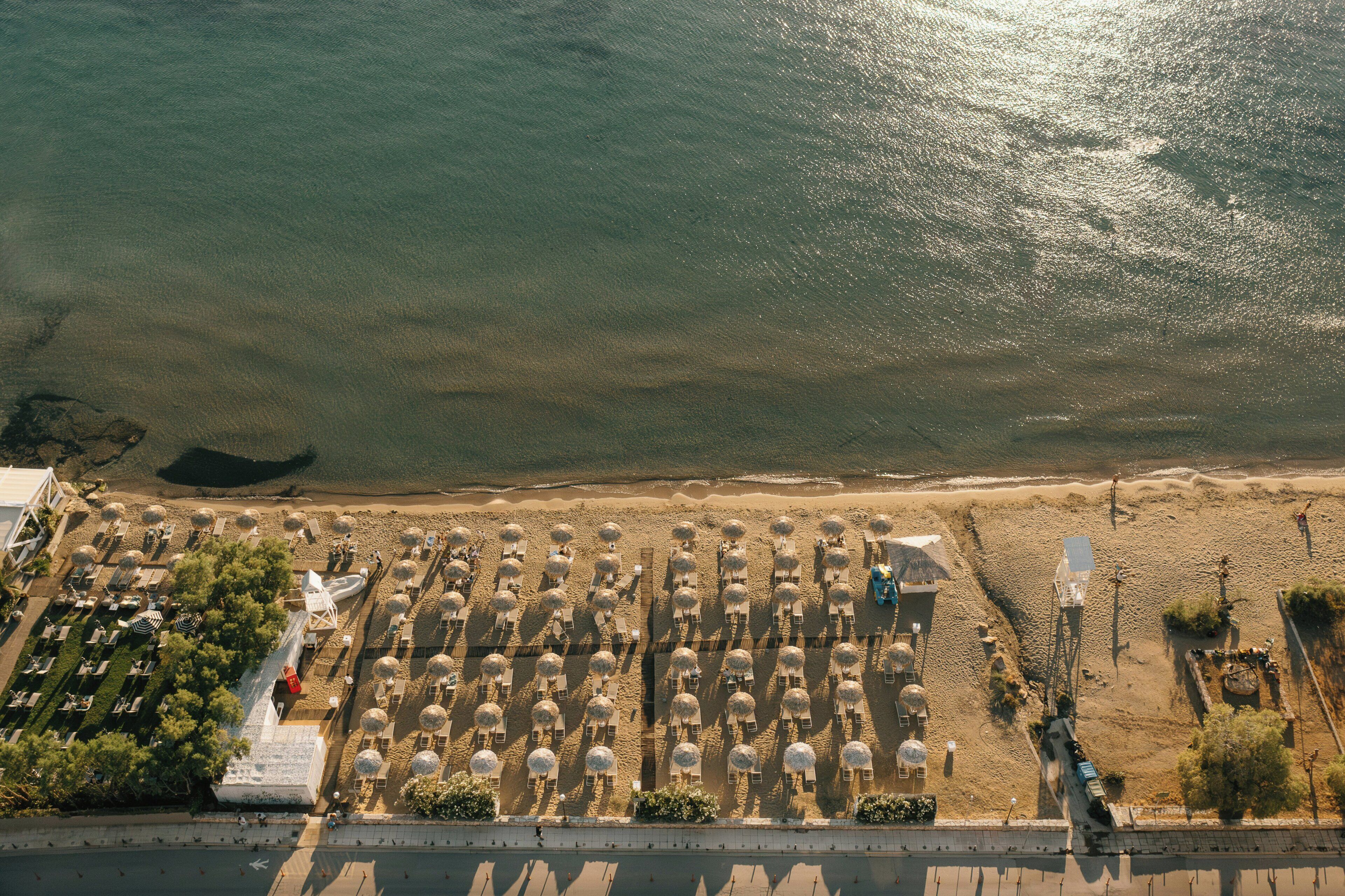 Sun loungers, beach umbrellas, beach towels, beach bar