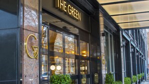 A building facade with a sign reading "THE GREEN" and a series of windows. - The Green (Dublin)