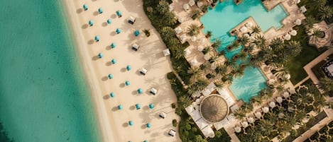 Outdoor pool, free cabanas, pool umbrellas