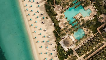 Outdoor pool, free cabanas, pool umbrellas