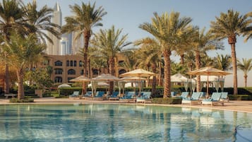 Outdoor pool, free pool cabanas, pool umbrellas