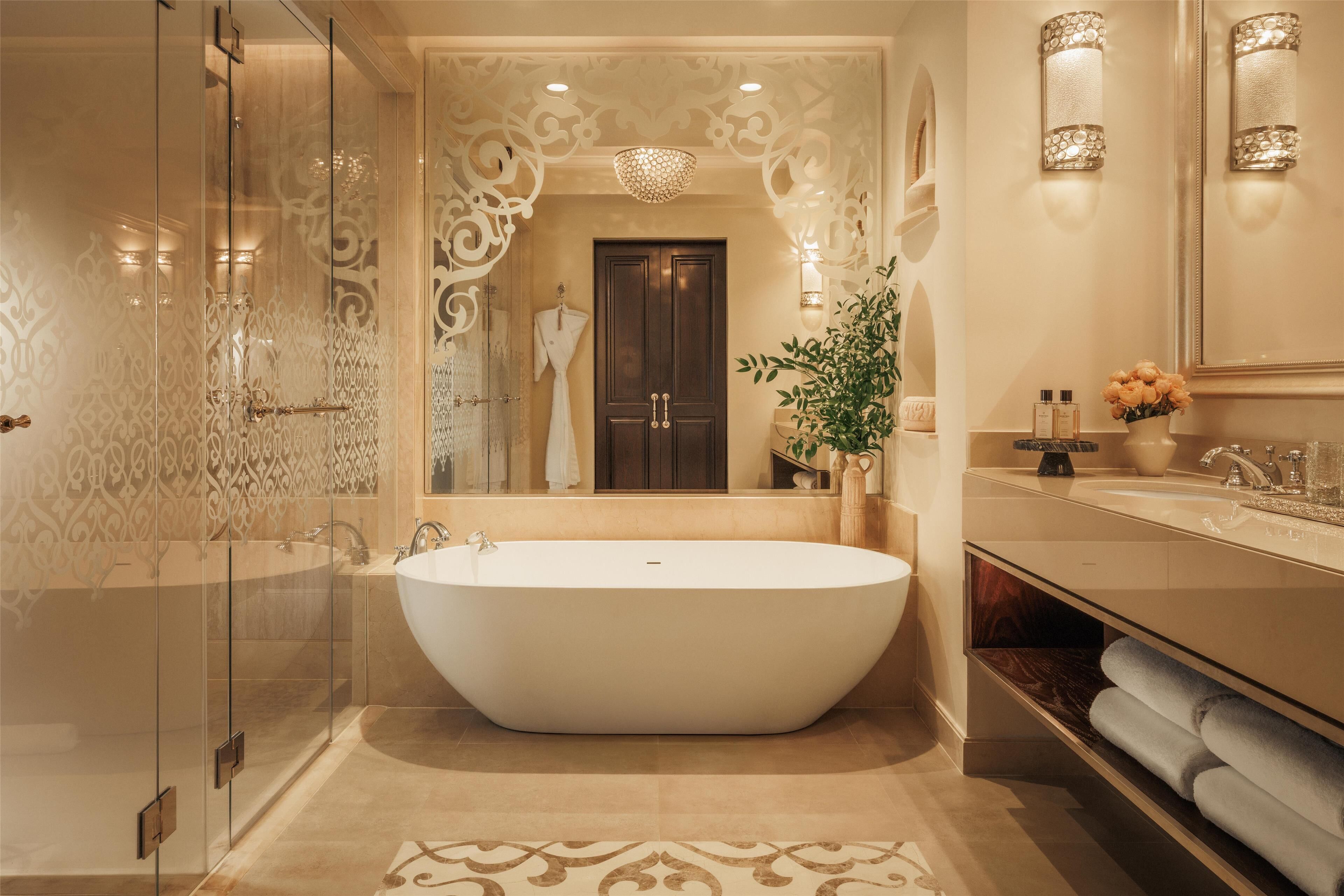 separate bathtub and shower, deep-soaking bathtub, designer toiletries