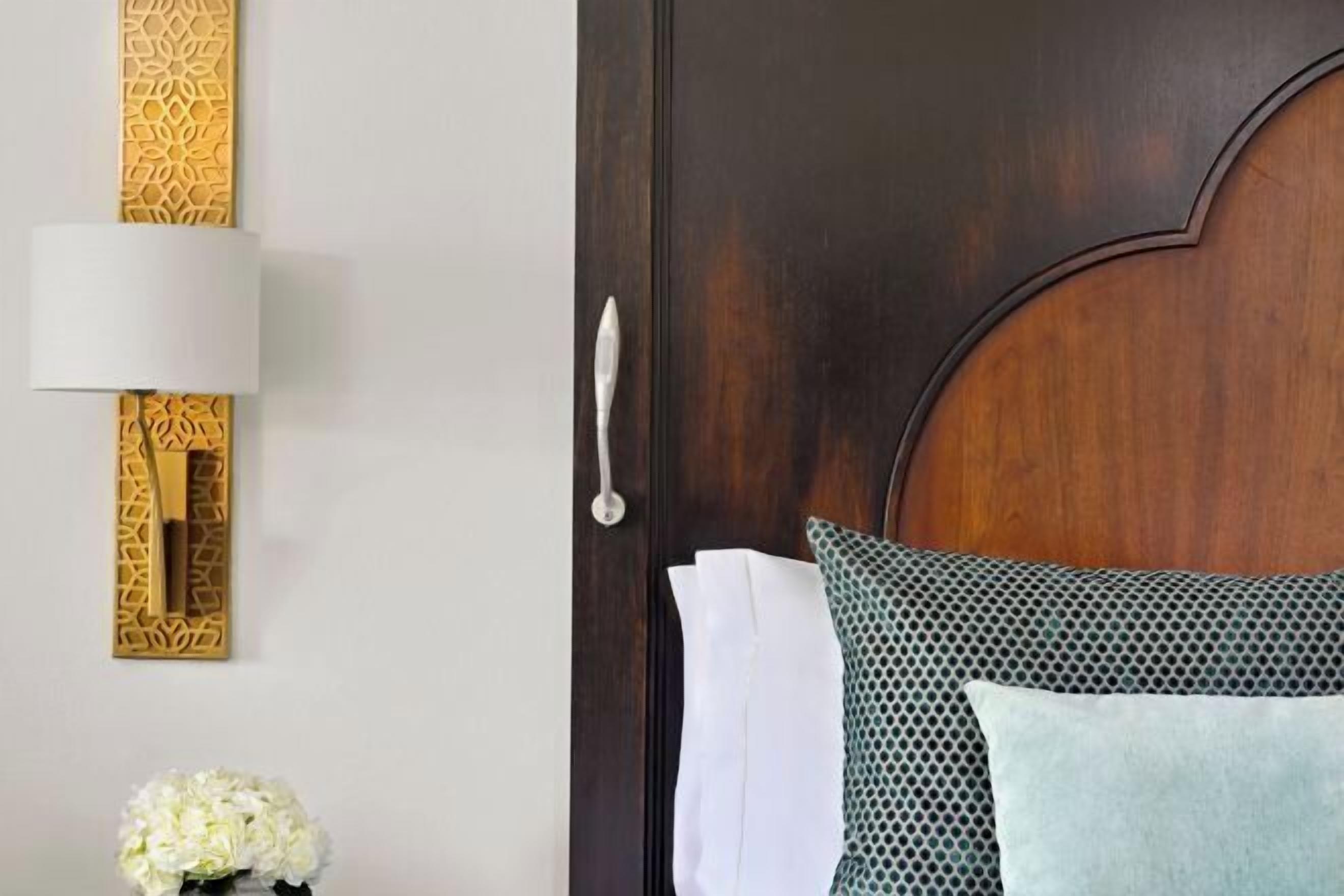 Frette Italian sheets, premium bedding, down duvets, minibar