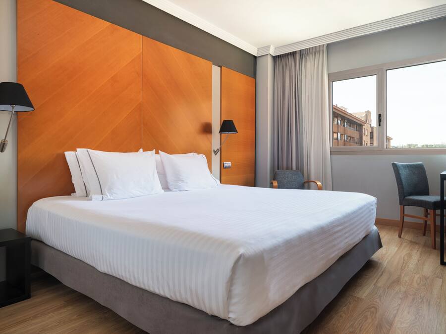 Ropa de cama de alta calidad y minibar