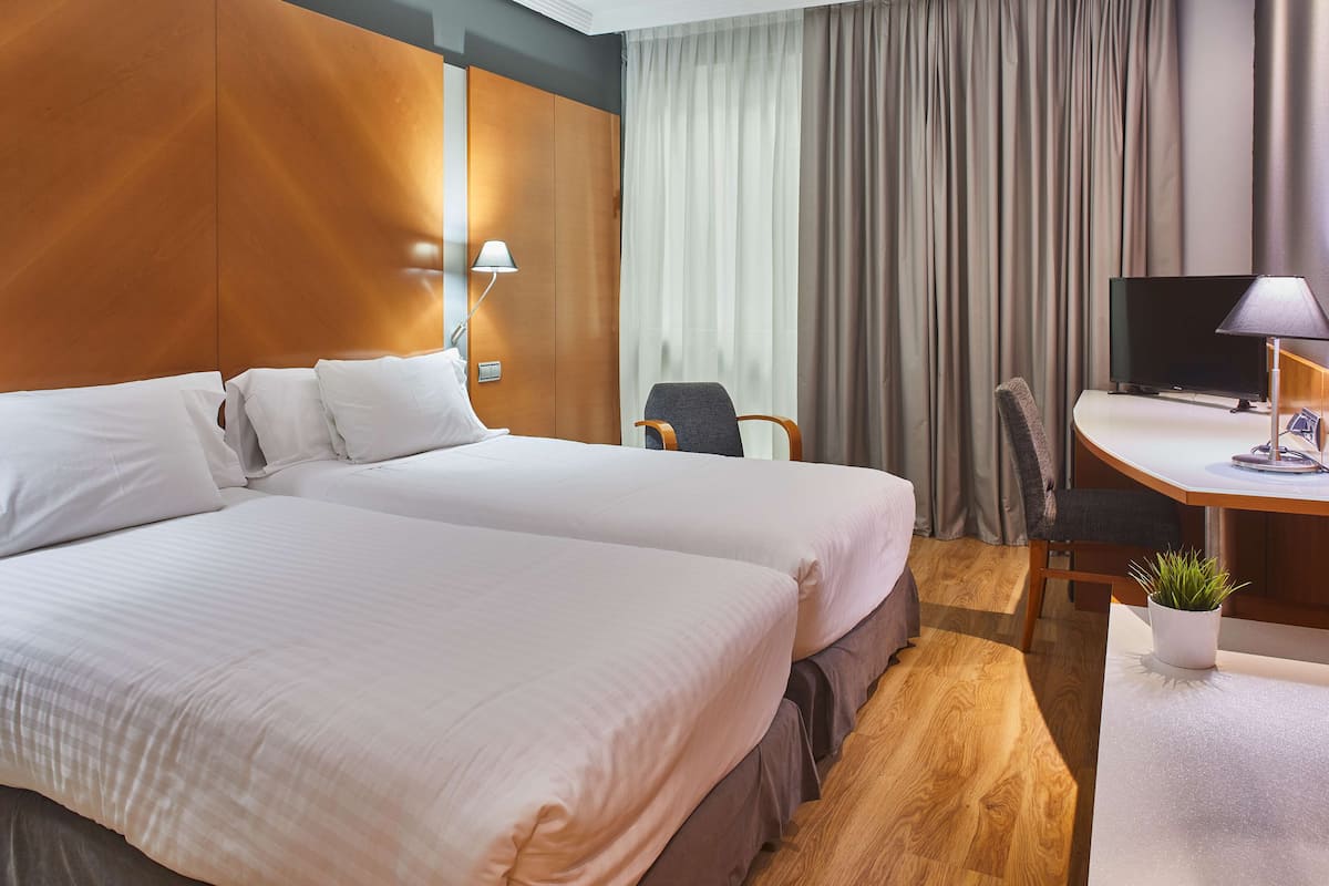 Family Room | Premium bedding, minibar, in-room safe, desk