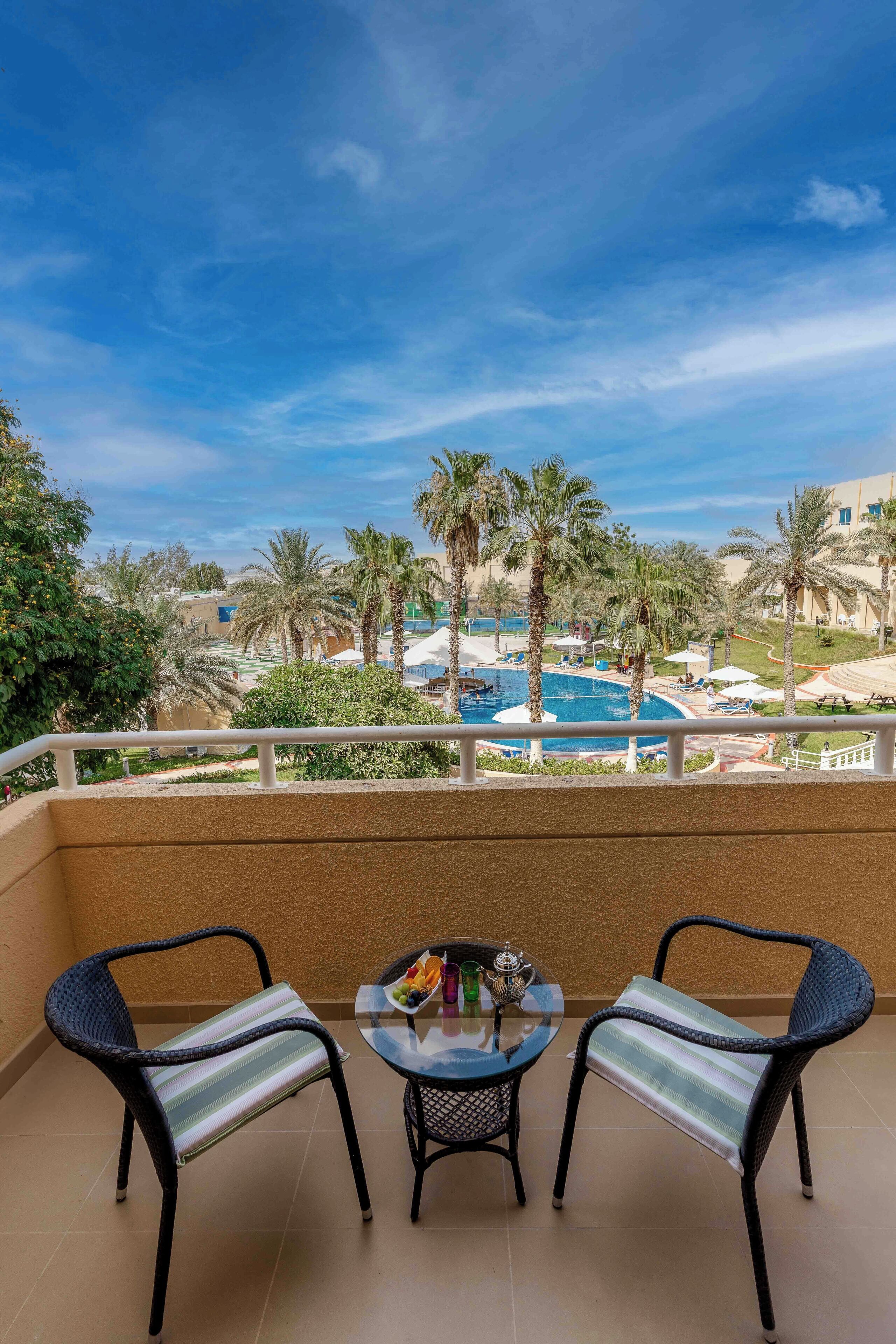 DELUXE KING POOL VIEW | Balcony