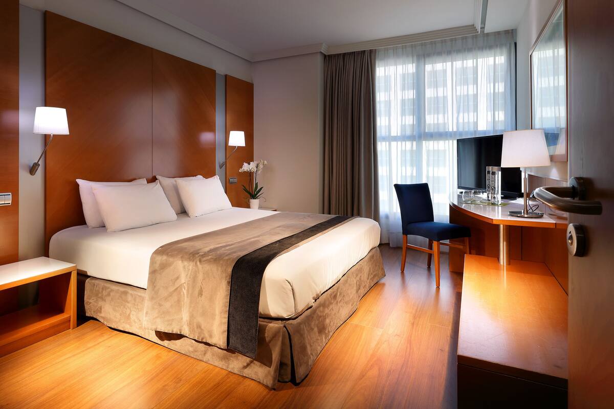 Hypo-allergenic bedding available, down comforters, minibar