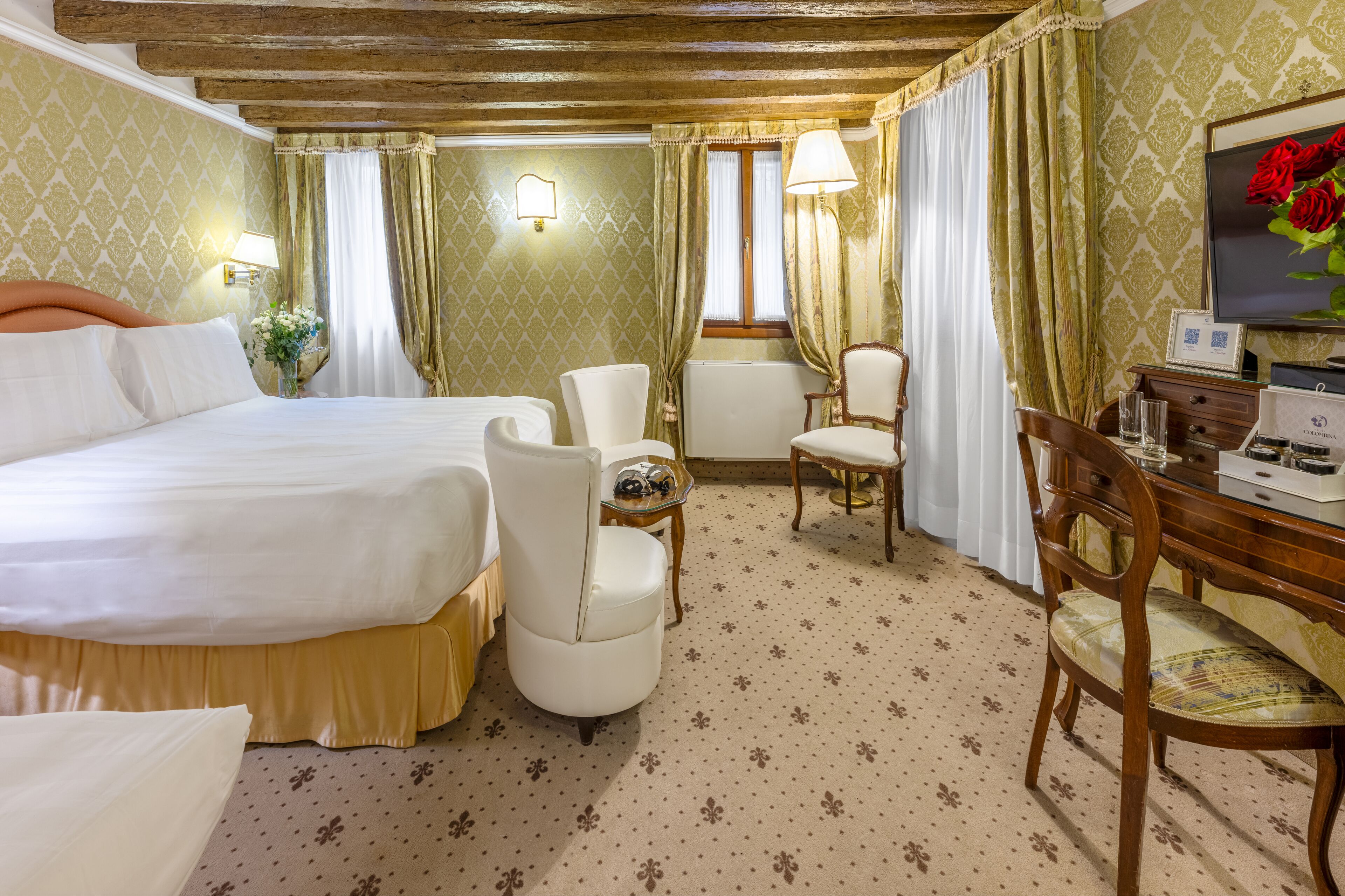 deluxe triple room, canal view | 1 bedroom, premium bedding, minibar, in-room safe