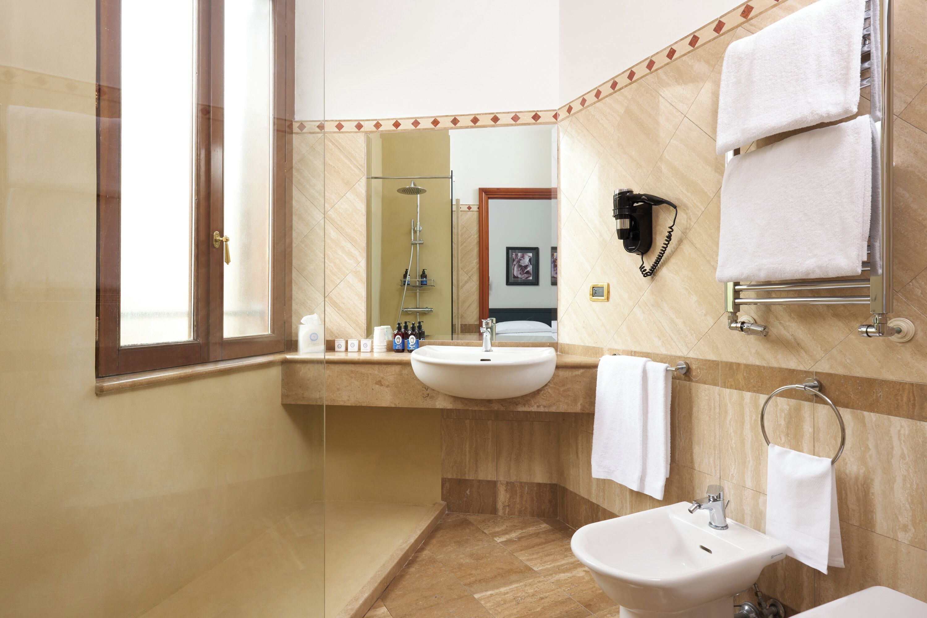 standard double room | bathroom | shower, rainfall showerhead, free toiletries, hair dryer