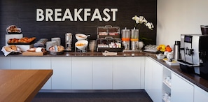 Daily buffet breakfast (CHF 18 per person)