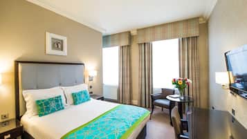 Desk, blackout drapes, iron/ironing board, free cribs/infant beds