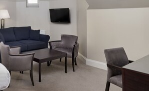 Superior King with Sofa | Desk, blackout drapes, iron/ironing board, free cribs/infant beds
