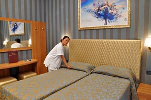 Ropa de cama de alta calidad y minibar 