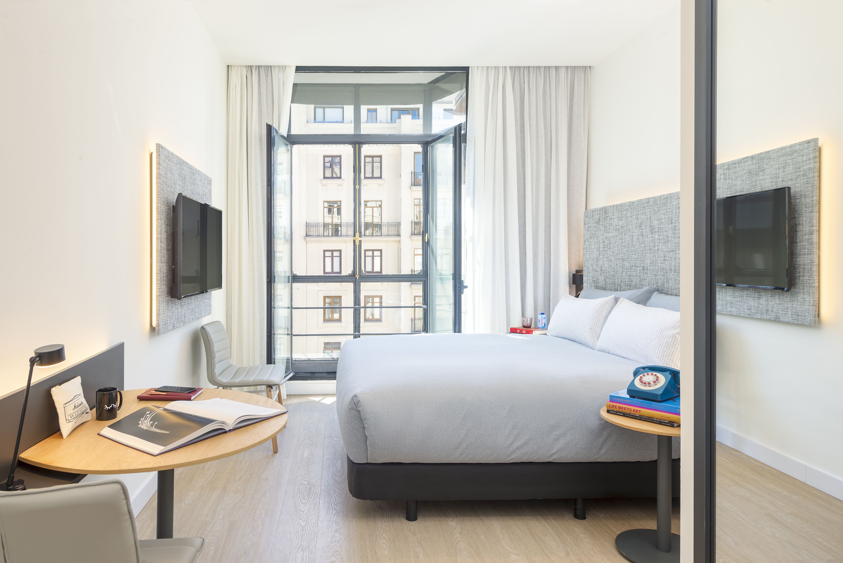 the innside room gran via view | hypo-allergenic bedding, down duvets, free minibar, in-room safe