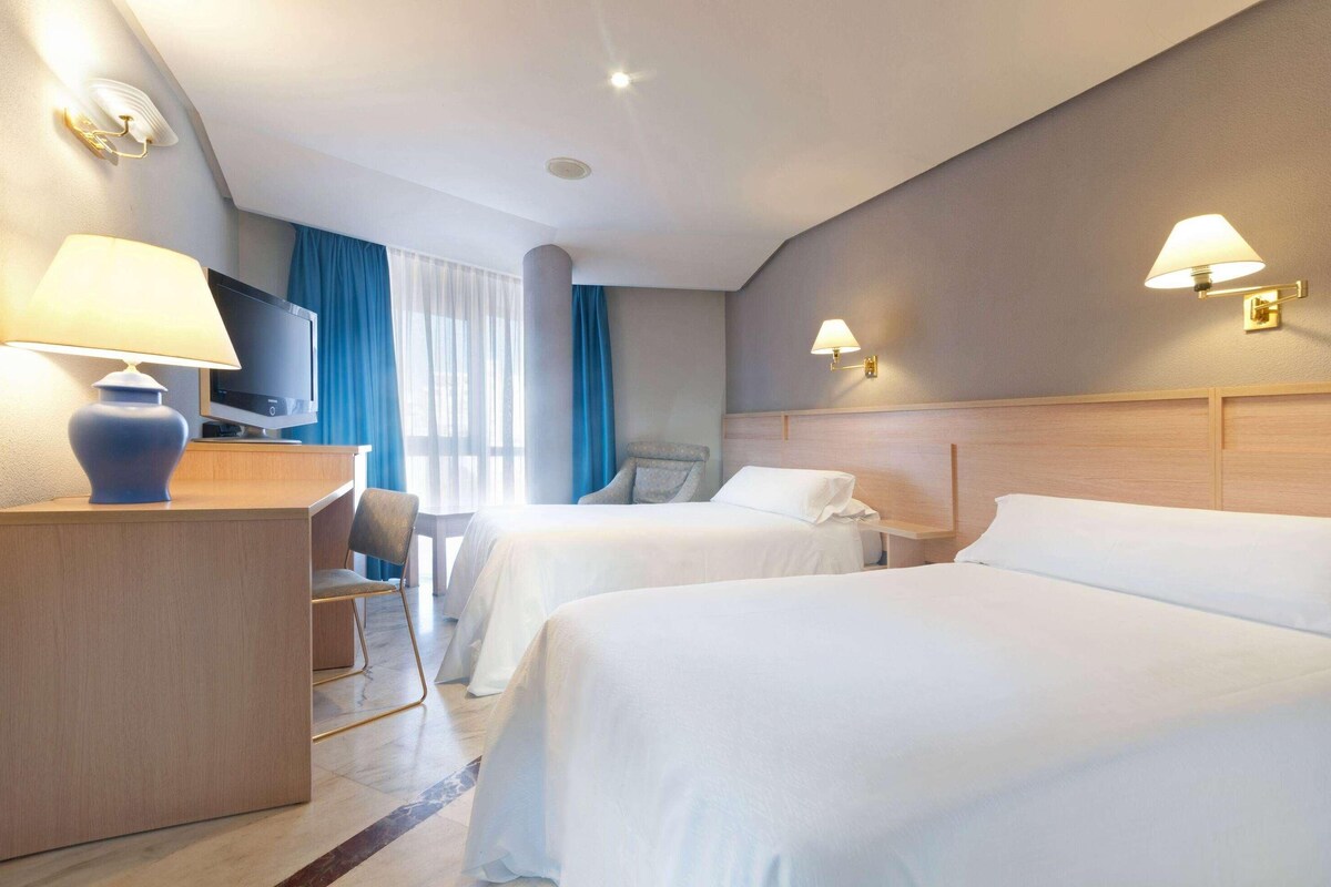 Down comforters, minibar, in-room safe, desk