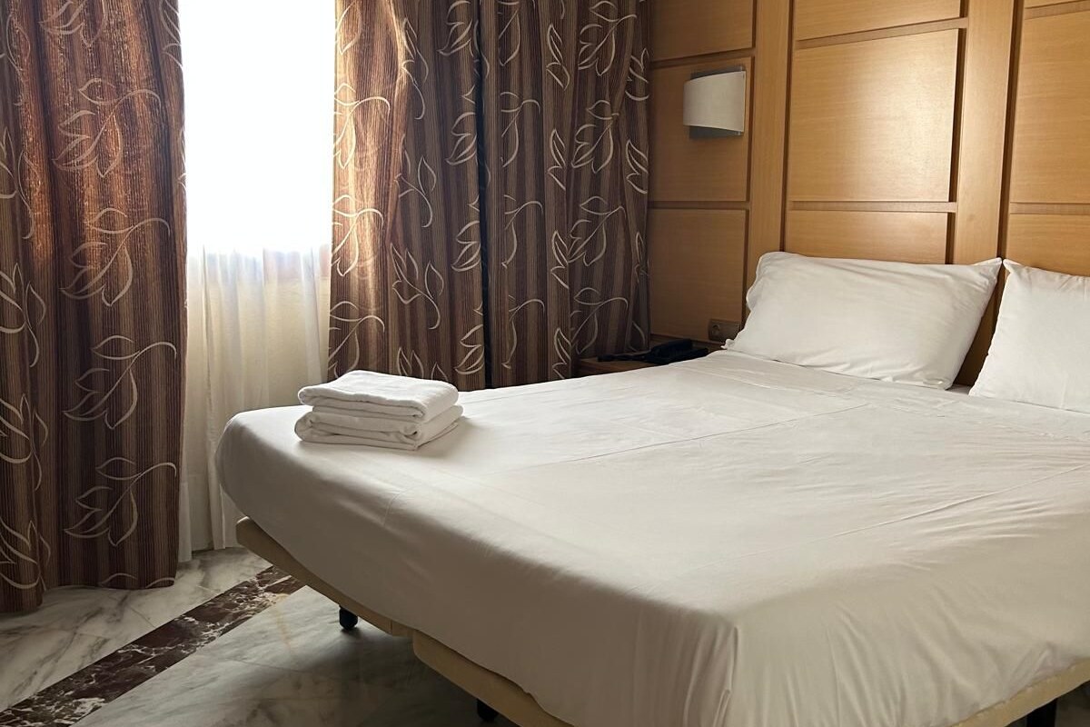 Family Double Room | Down comforters, minibar, in-room safe, desk