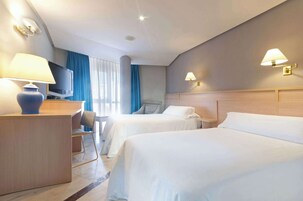 Down comforters, minibar, in-room safe, desk