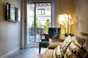 Deluxe Double Room Single Use, Terrace | Minibar, in-room safe, desk, soundproofing