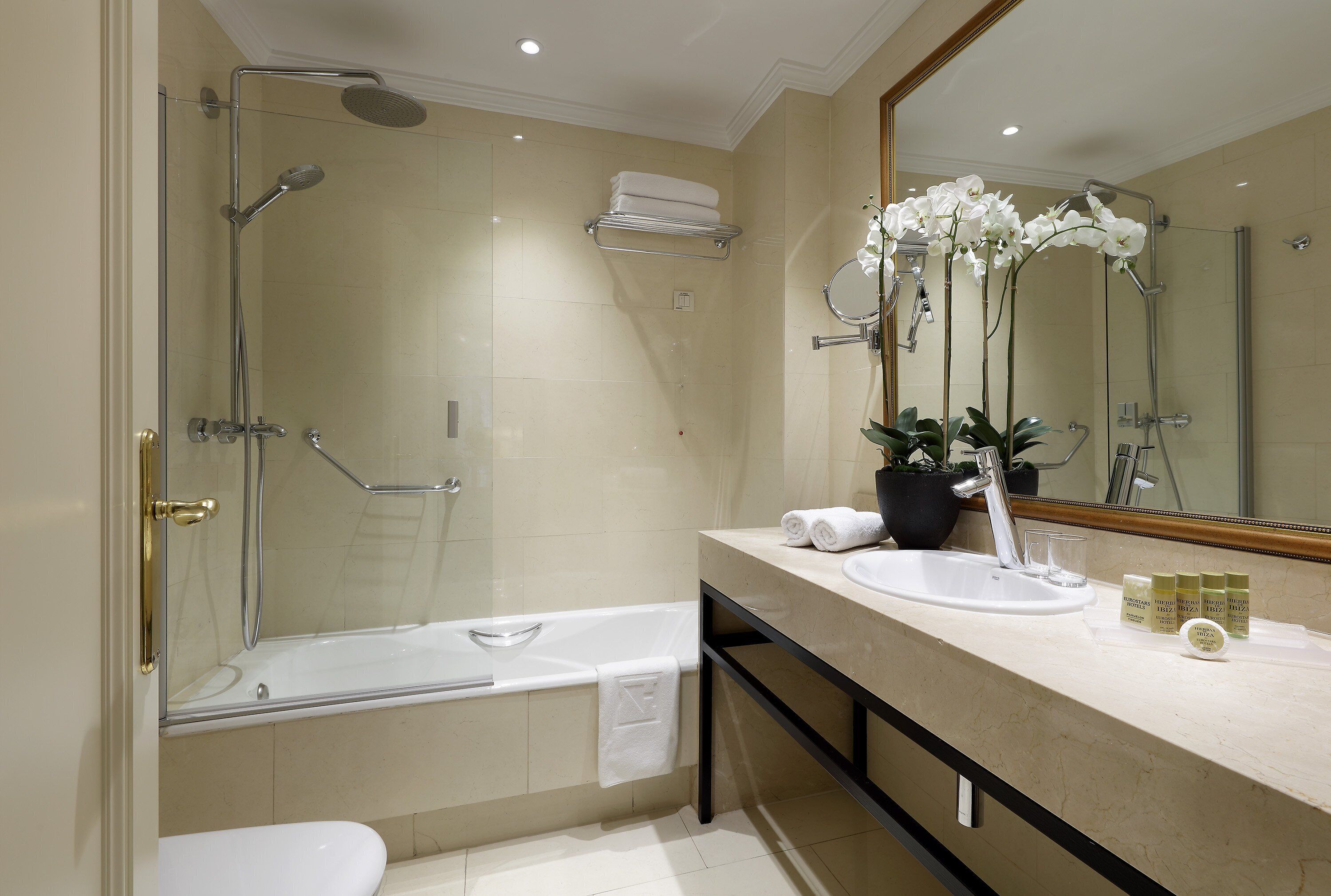 eco-friendly toiletries, hair dryer, bidet, towels