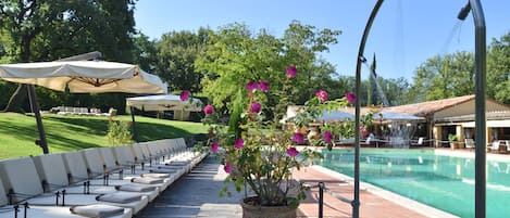 Seasonal outdoor pool, pool loungers