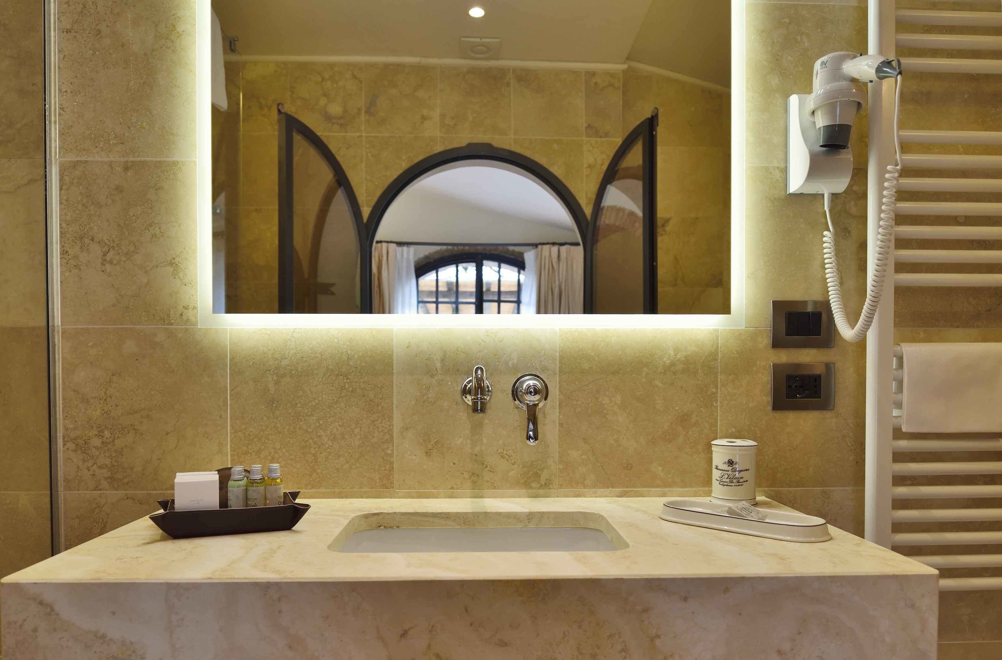 deluxe room, terrace | bathroom | bathtub, rainfall showerhead, hair dryer, slippers