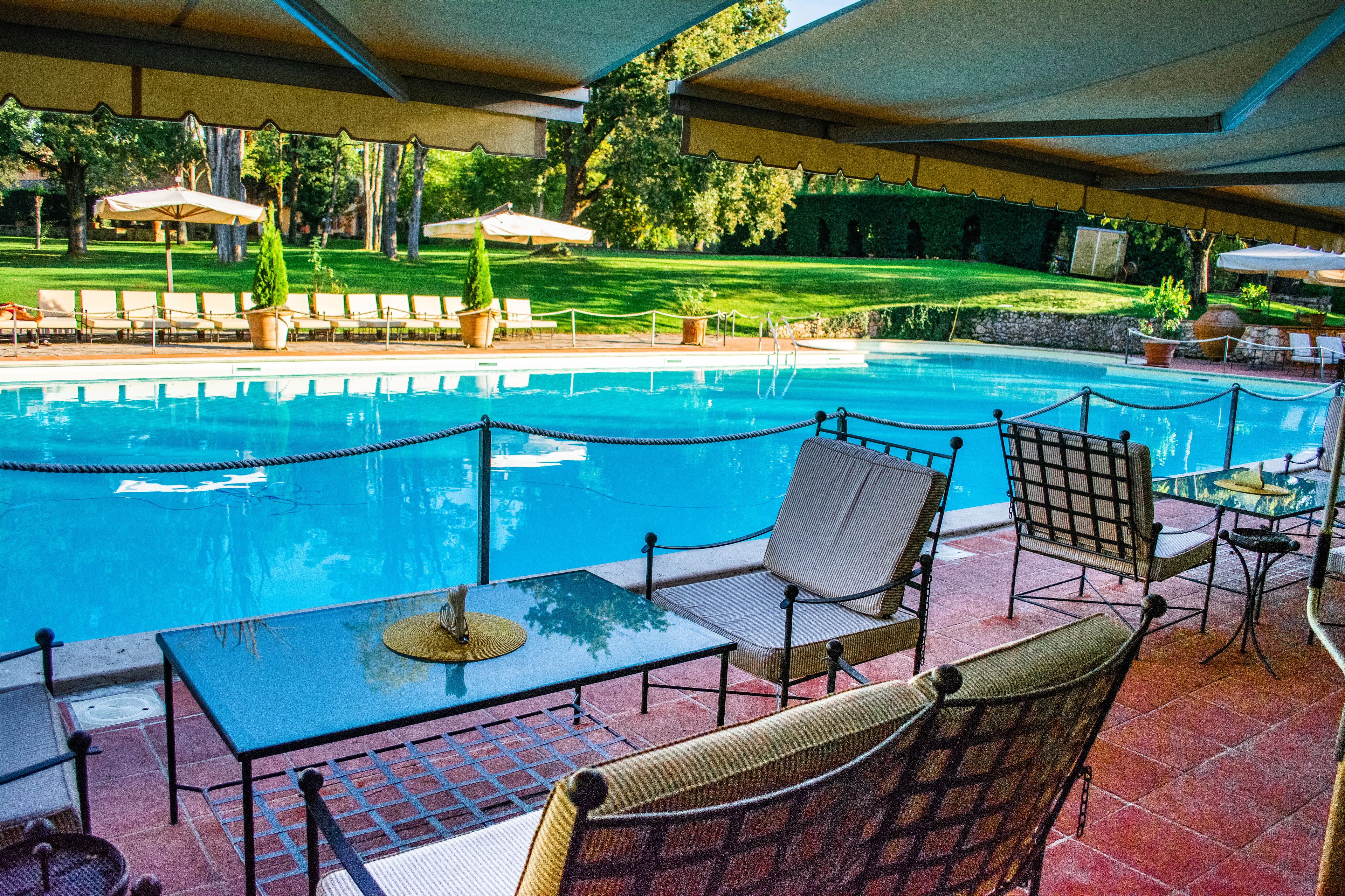 seasonal outdoor pool, pool loungers