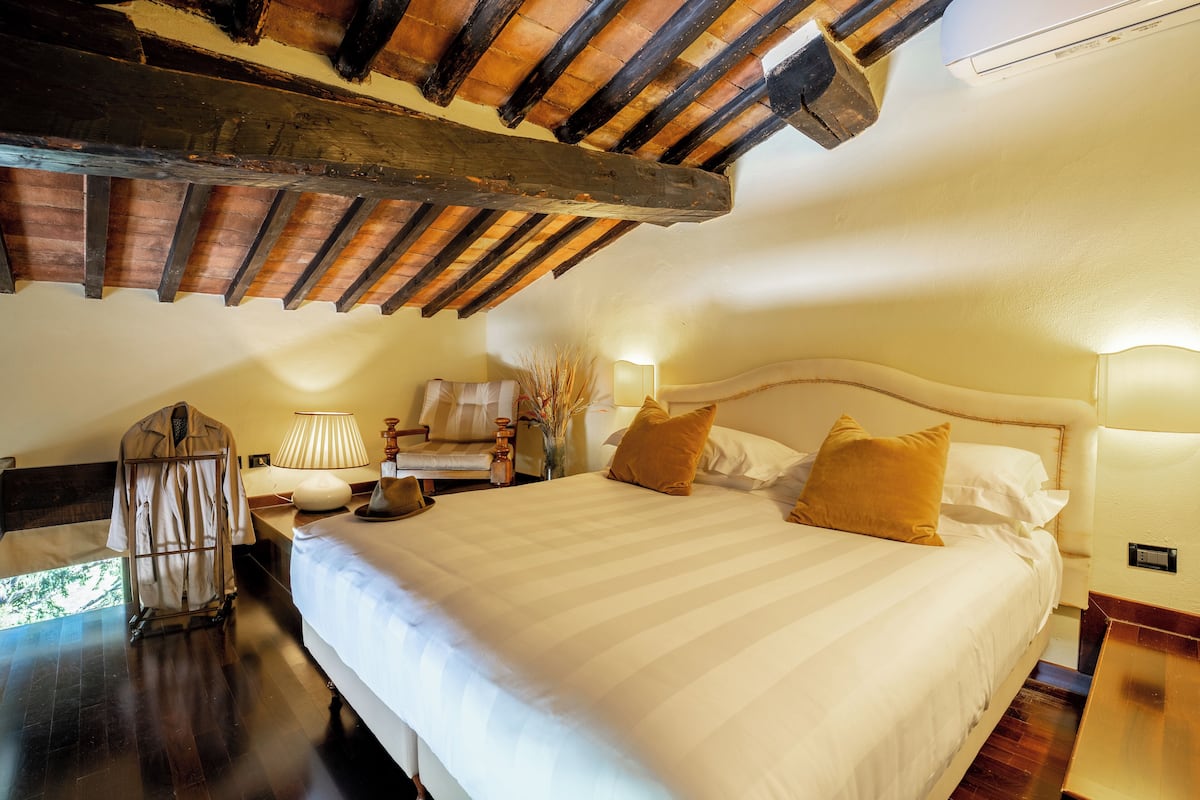 Habitació Deluxe | Roba de llit d'alta qualitat i cobrellits 
