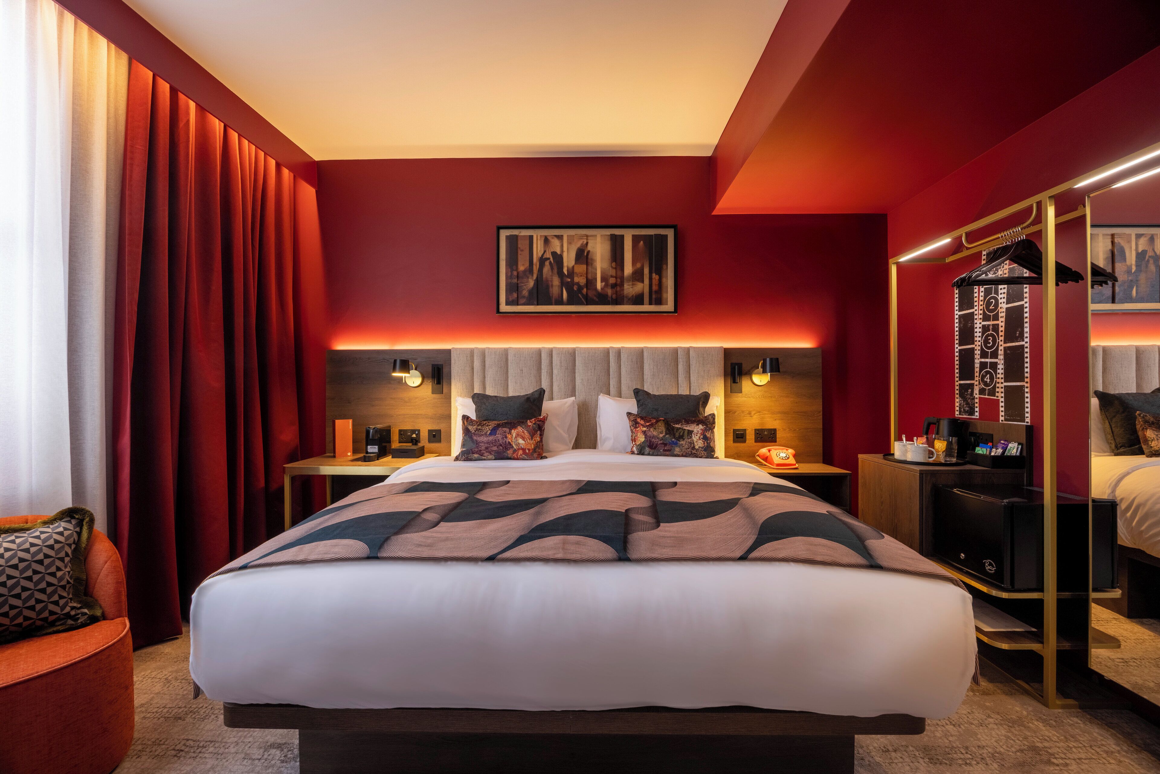 Premium bedding, desk, laptop workspace, iron/ironing board