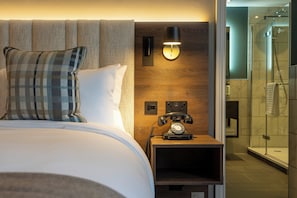 Premium bedding, desk, laptop workspace, iron/ironing board