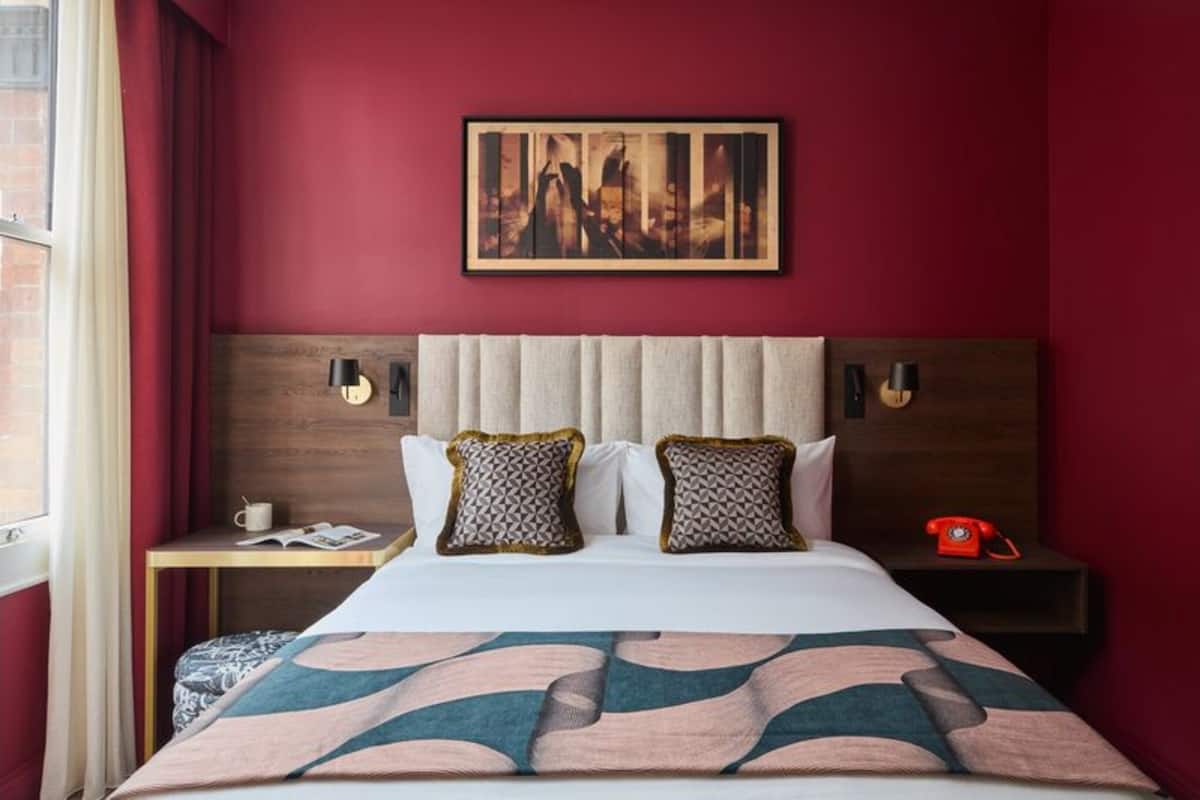 Premium bedding, desk, laptop workspace, iron/ironing board