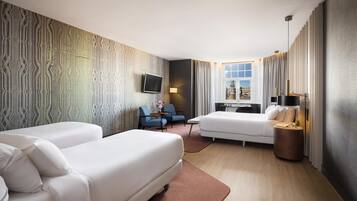 Kamar Quadruple Keluarga | 1 kamar tidur, minibar, meja kerja, dan tirai kedap cahaya