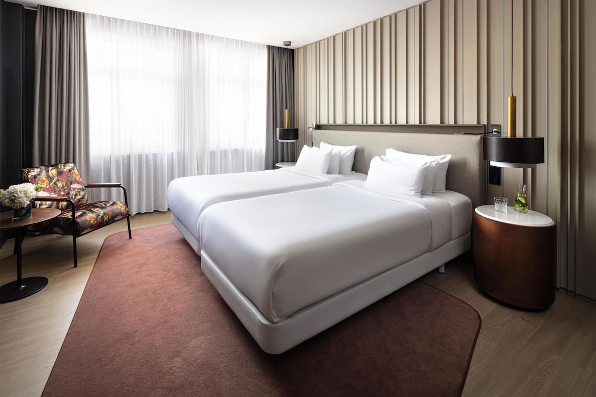 Junior Suite | 1 bedroom, minibar, desk, blackout drapes